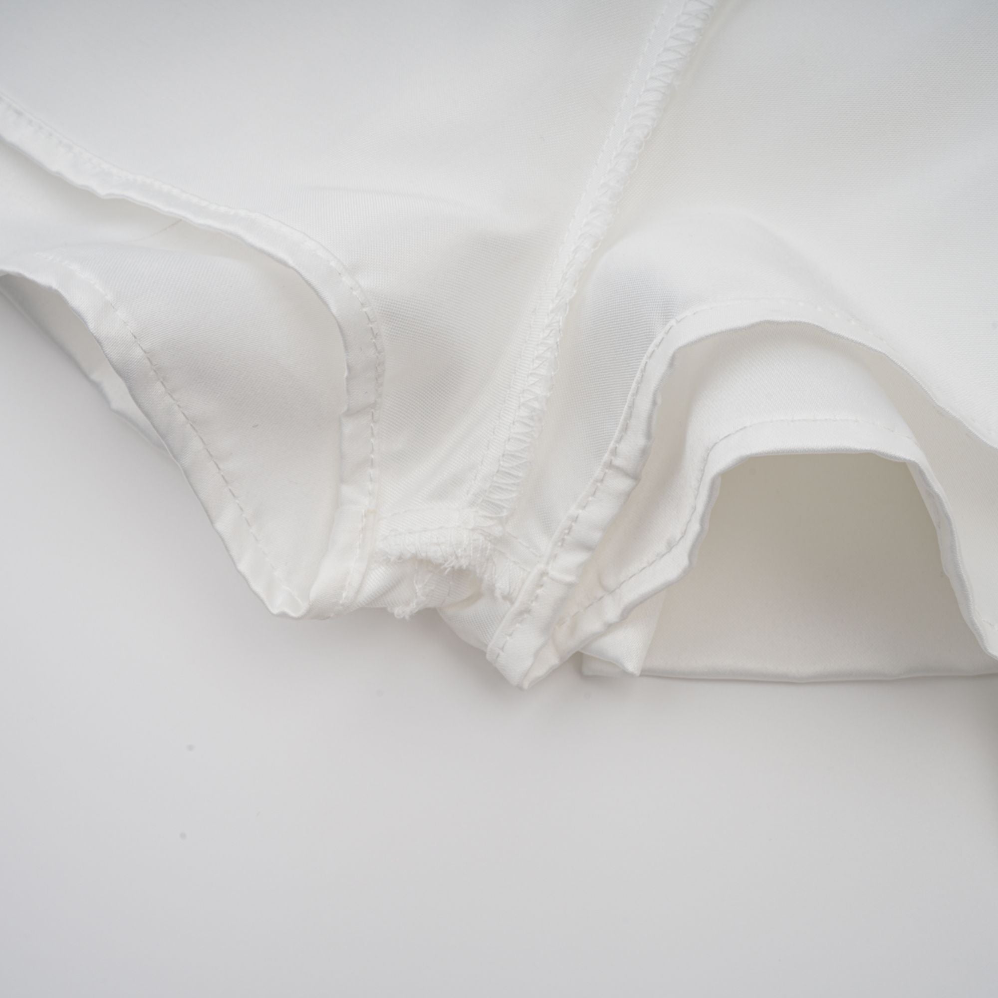 Avellia Celeste White Halterneck Ruffled Mini Dress