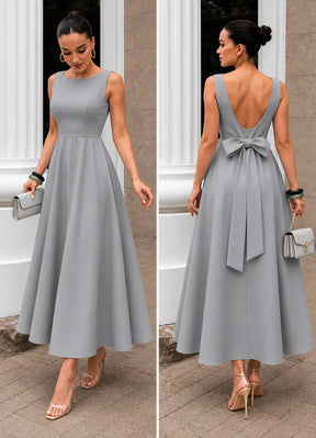 Vestido Longo com Decote Canoa e Laço nas Costas | Evelinne
